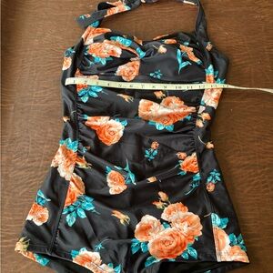 Stylish Vintage-inspired Black Swimsuit with Orange Floral Accents